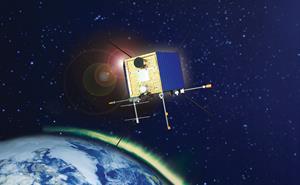 A cubic satellite in space. The Earth and airglow in the background.
